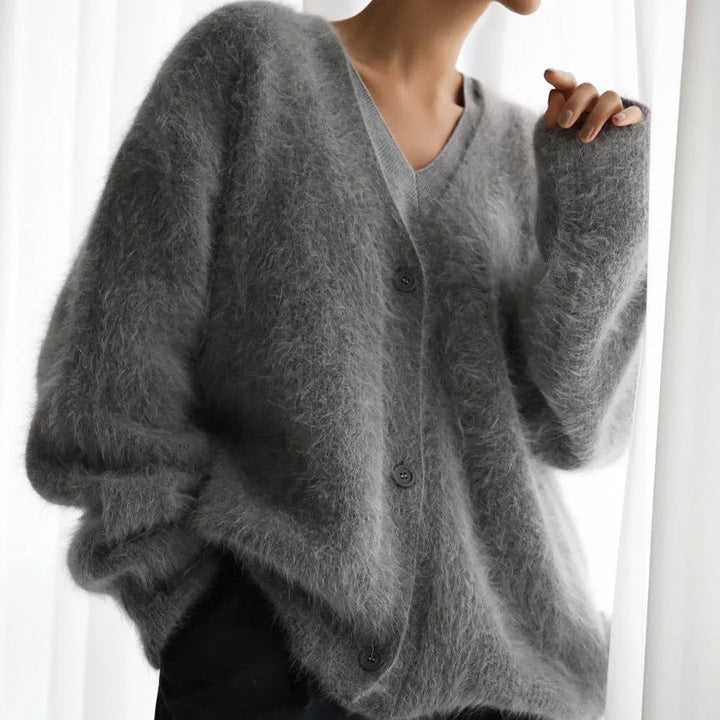 Soft, casual women's oversized V-neck cardigan, great for everyday stylish layering.