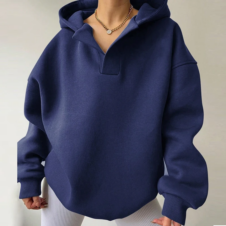 Cozy women's oversized v-neck hoodie. Ideal pullover for loungewear, casual outings, or relaxed fall fashion.