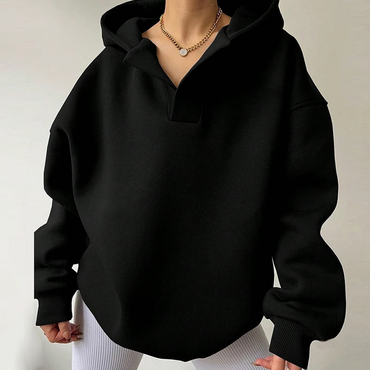 Relaxed fit women's v-neck oversized hoodie. Soft, long-sleeve pullover for ultimate cozy comfort and casual style.