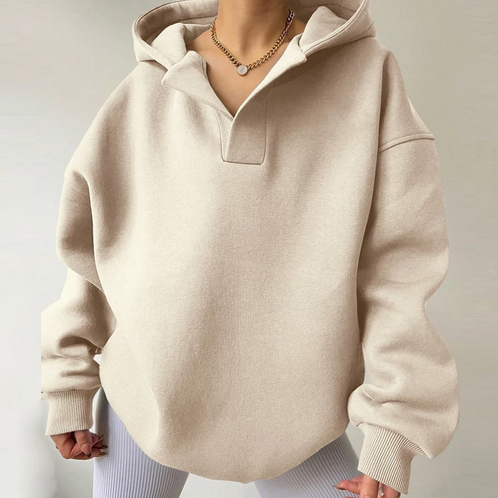 Women's oversized v-neck hoodie. Long sleeve pullover top for cozy comfort, relaxed fit casual and lounge wear.