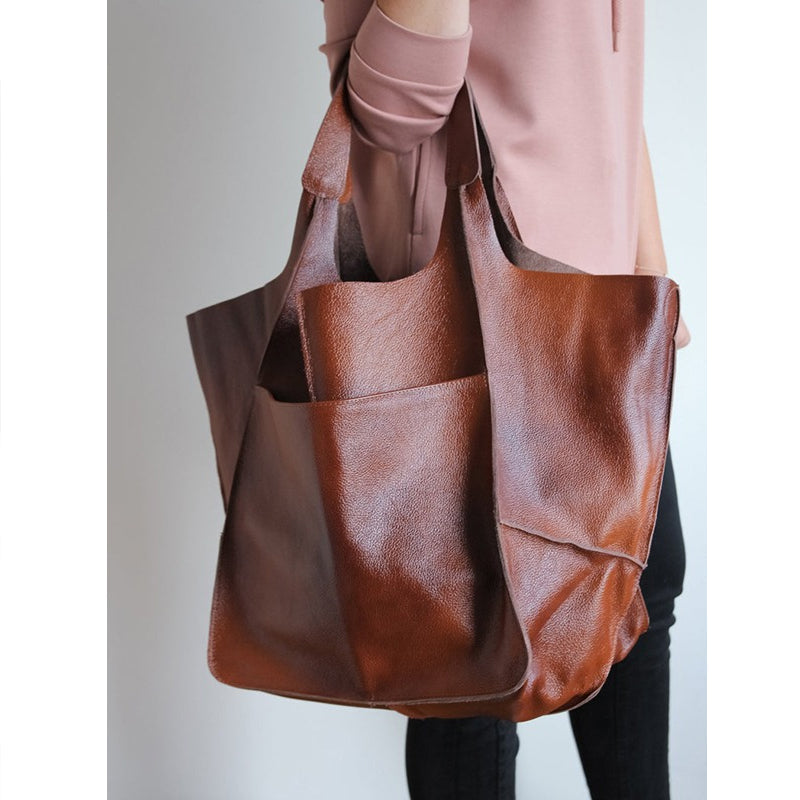 Versatile women's oversized vintage leather shoulder bag, perfect for work, travel, or daily fashion.