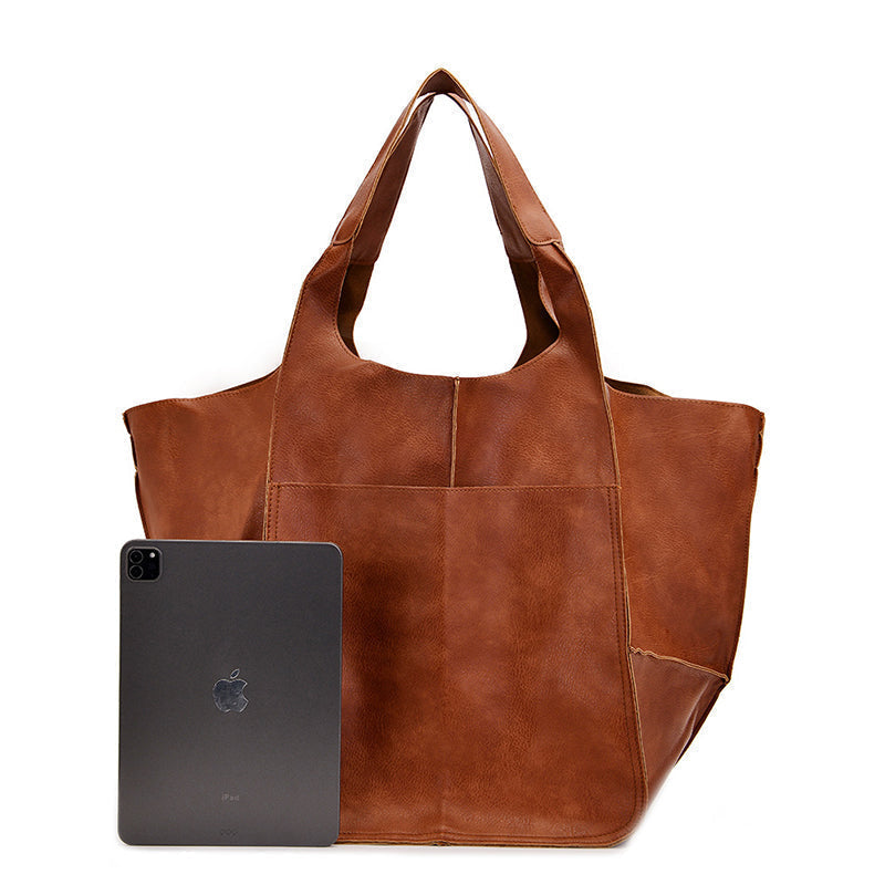 Distressed look women's oversized vintage leather shoulder bag, a trendy & functional everyday tote.