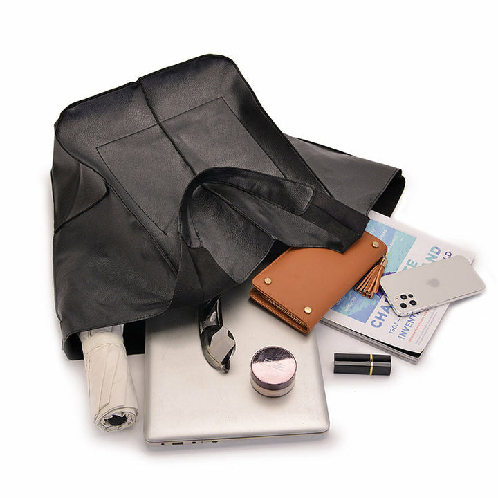 Boho-chic women's oversized vintage leather shoulder bag, a versatile and stylish everyday accessory.