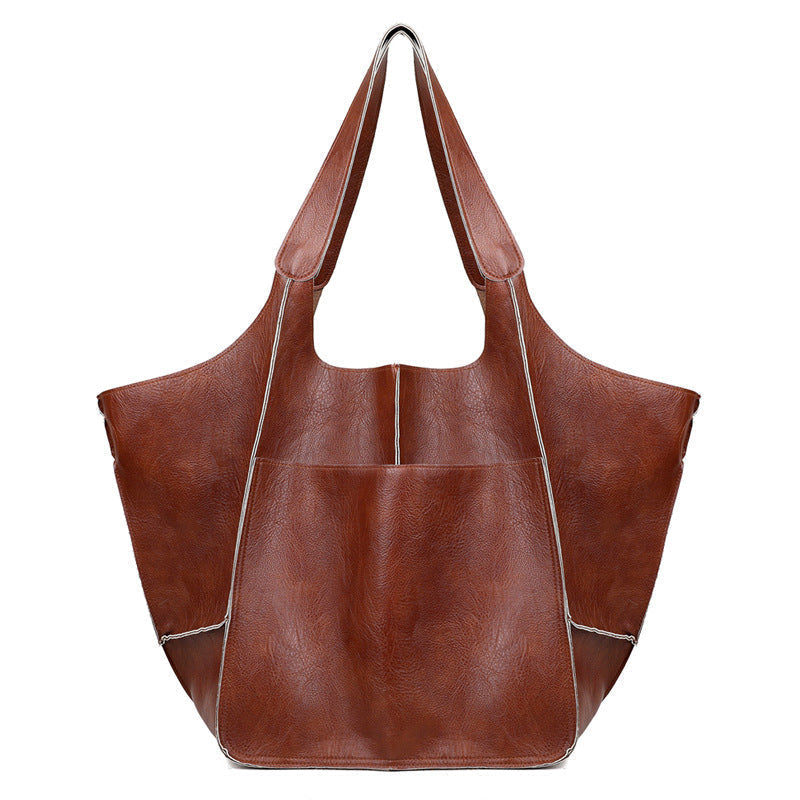 Oversized vintage leather tote bag for women, also a stylish shoulder bag for everyday essentials.