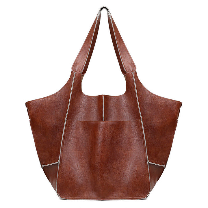 Oversized vintage leather tote bag for women, also a stylish shoulder bag for everyday essentials.