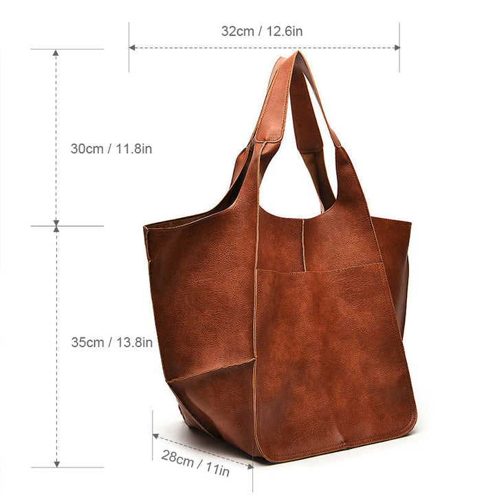 Practical women's oversized vintage leather shoulder bag, spacious and stylish for daily errands.