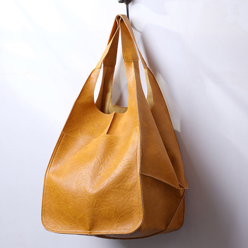 Genuine leather oversized vintage shoulder bag for women, perfect as a fashion tote & daily handbag.