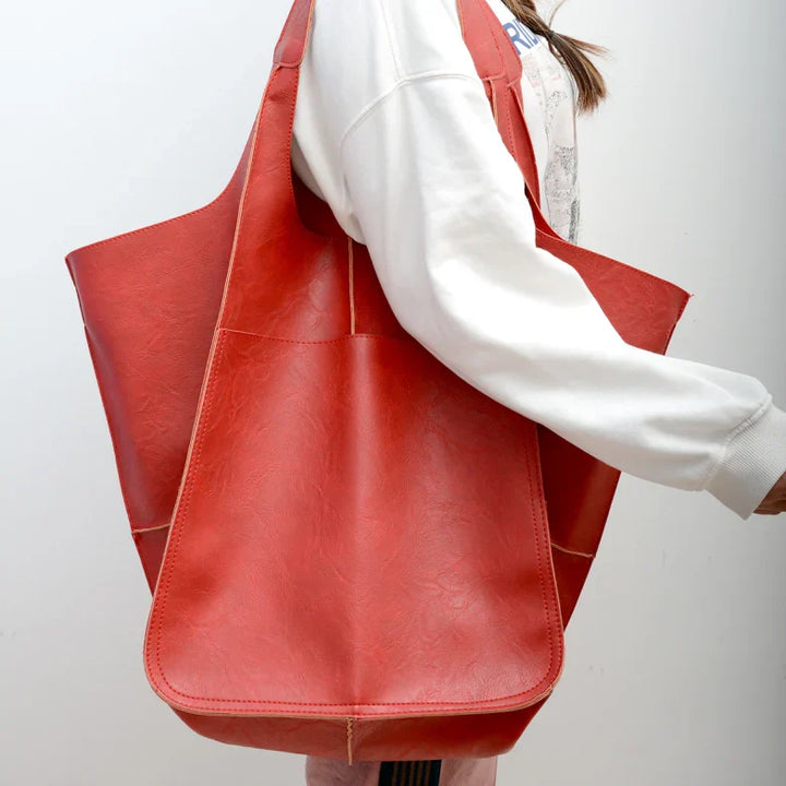 Stylish women's oversized vintage leather shoulder bag, a practical and fashionable everyday tote.