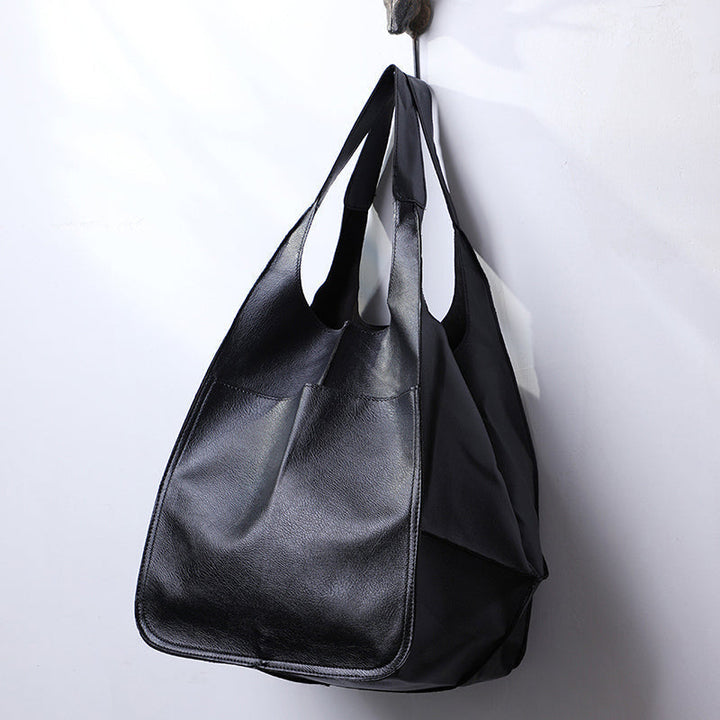 Rustic brown genuine leather oversized vintage women's shoulder bag, a fashionable everyday tote.