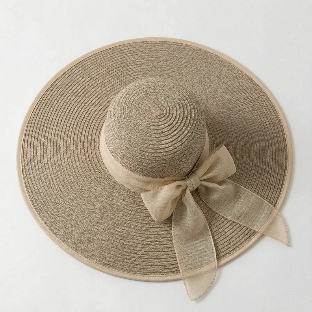 Oversized women's wide brim sun hat, offering chic style & superior UV protection.