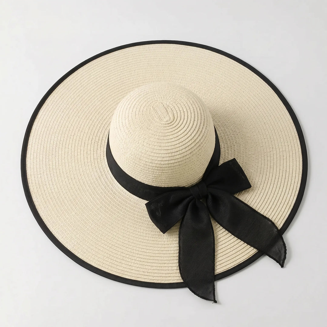 Women's wide brim sun hat, oversized for ultimate protection & chic beach style.