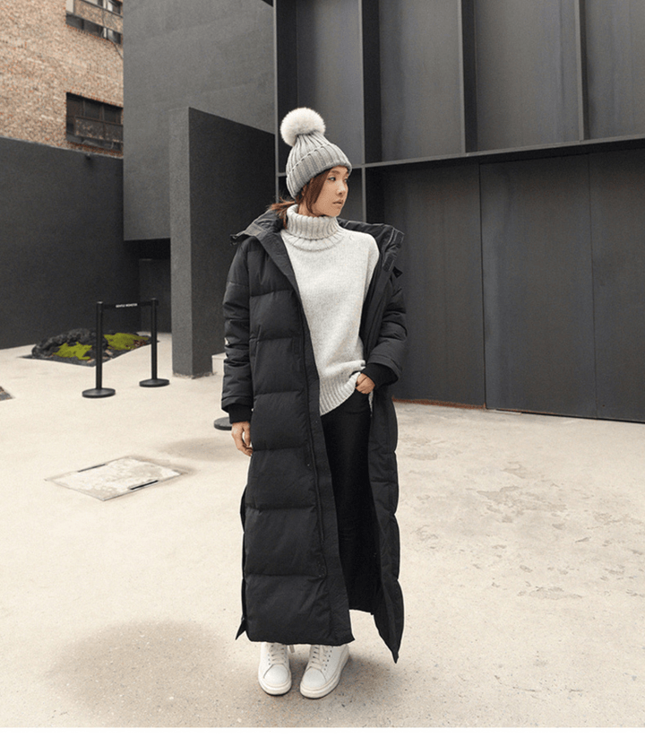 Fashionable women's oversized winter coat; waterproof outerwear for extreme cold protection.