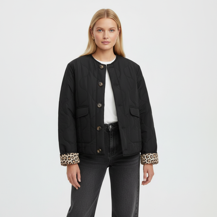 Stylish women's padded jacket, black, featuring a versatile leopard print interior, comfortable everyday outerwear