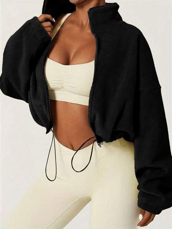 Palma Cropped Zip Jacket for women. Modern high-collar design, comfortable fit, & adjustable hem for casual style.