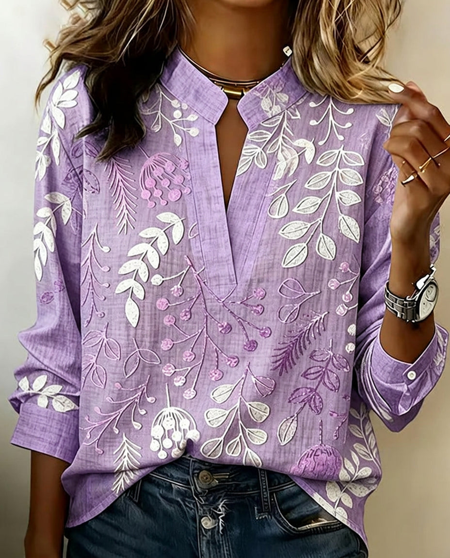 Women's pastel floral V-neck blouse, ideal for elegant spring & summer style.