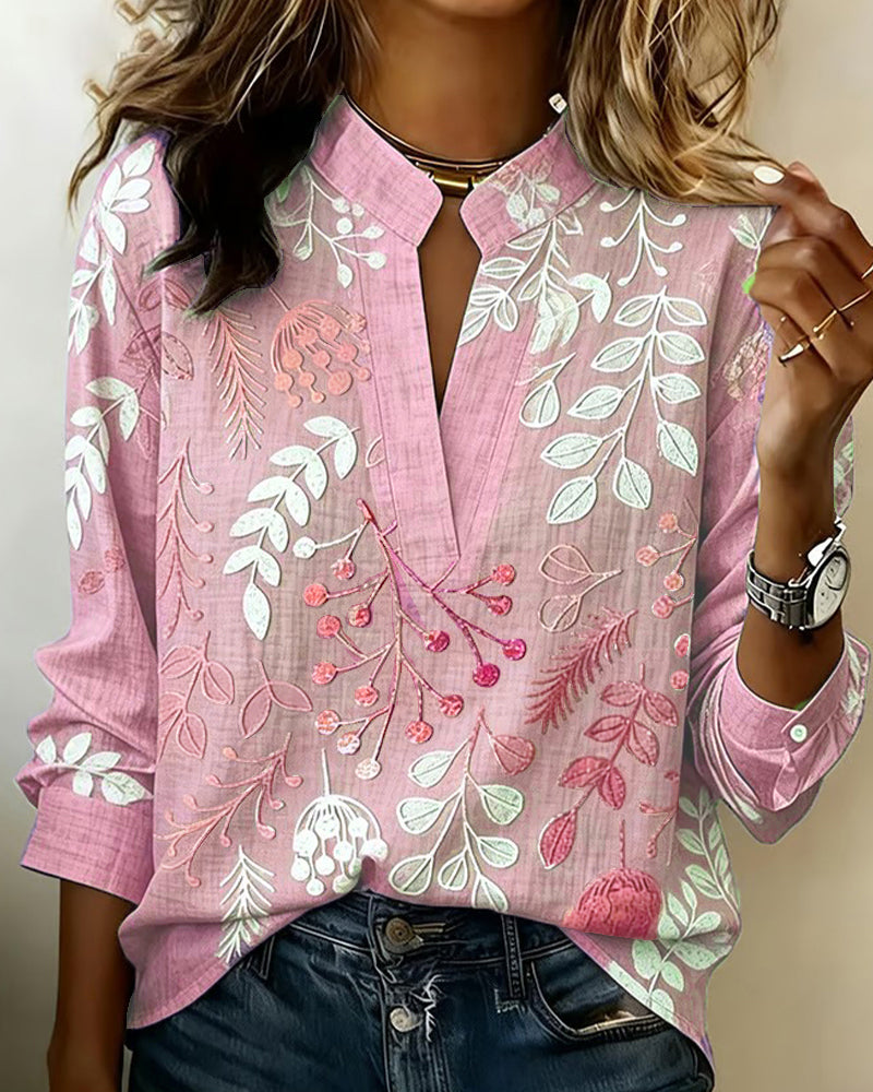 Fashionable women's pastel floral V-neck blouse, perfect for adding a touch of elegance to any outfit.