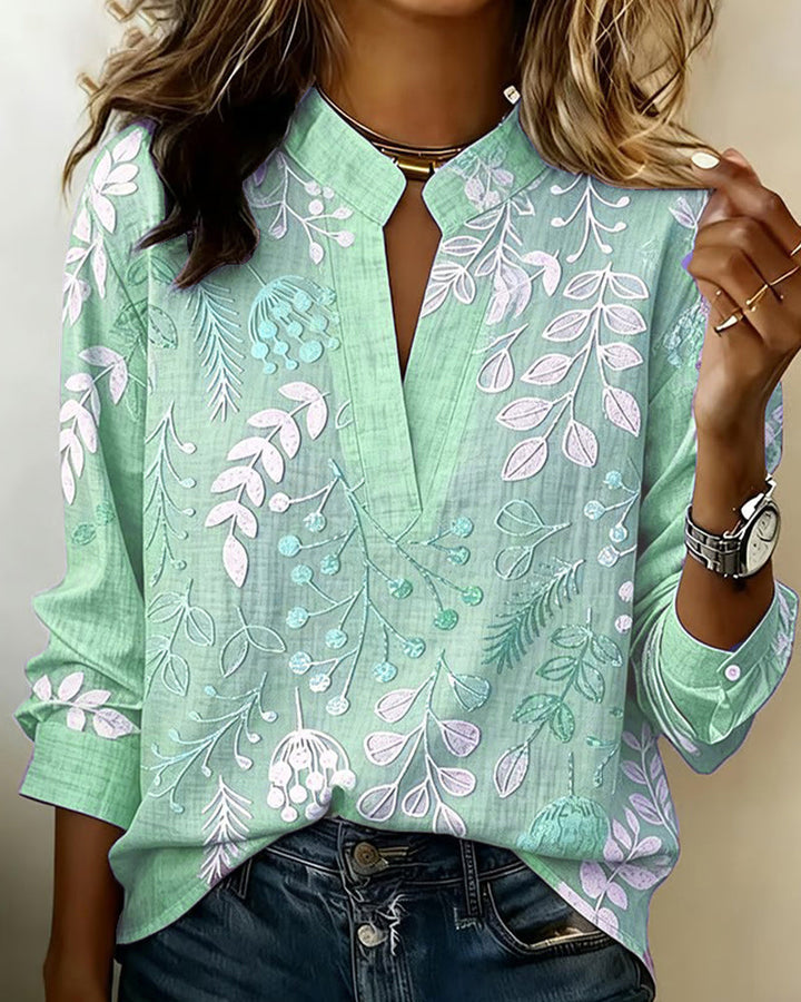 Casual women's pastel floral V-neck blouse, perfect for weekend wear & everyday comfort.