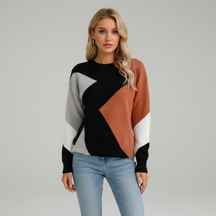 Comfortable women's pullover sweater with striking patchwork knit pattern, stylish winter top