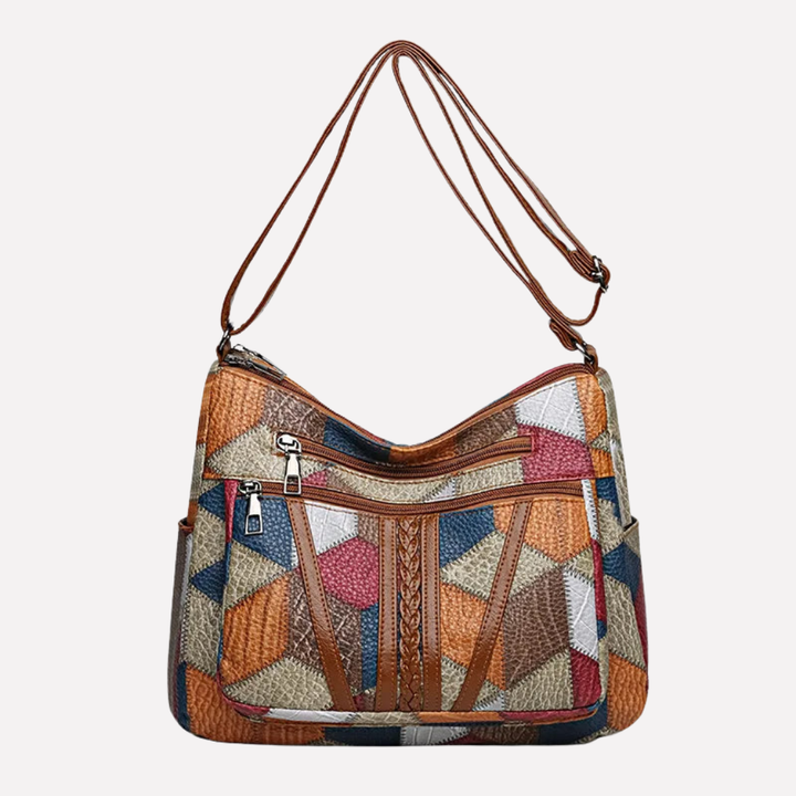 Women's patchwork shoulder bag with braided strap. Stylish and versatile everyday handbag.