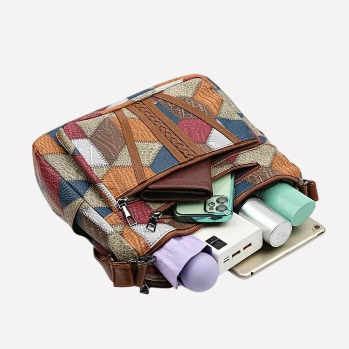 Fashionable women's patchwork shoulder bag with braided detail, a stylish and versatile accessory.