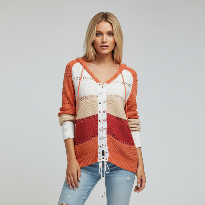 Versatile women's long sleeve sweater in a striped patchwork design with a trending lace-up feature