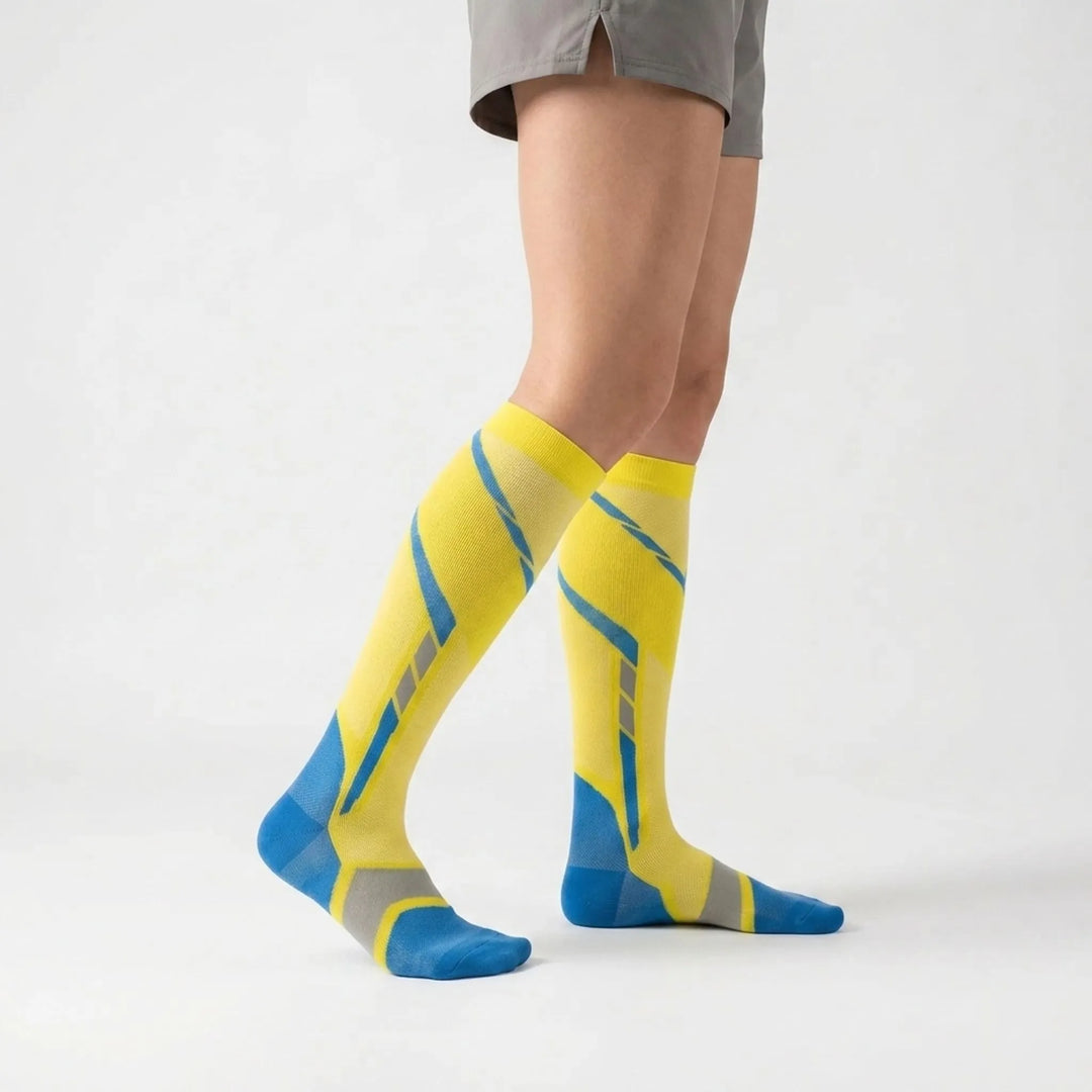 Breathable women's knee-high athletic socks, ideal for running, gym & activewear comfort.