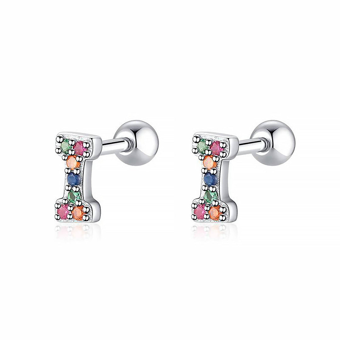 Pair of personalized sterling silver initial hoop earrings, elegant women's gift.