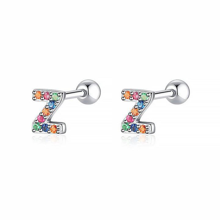 Personalized initial hoop earrings, sterling silver, a versatile women's accessory.