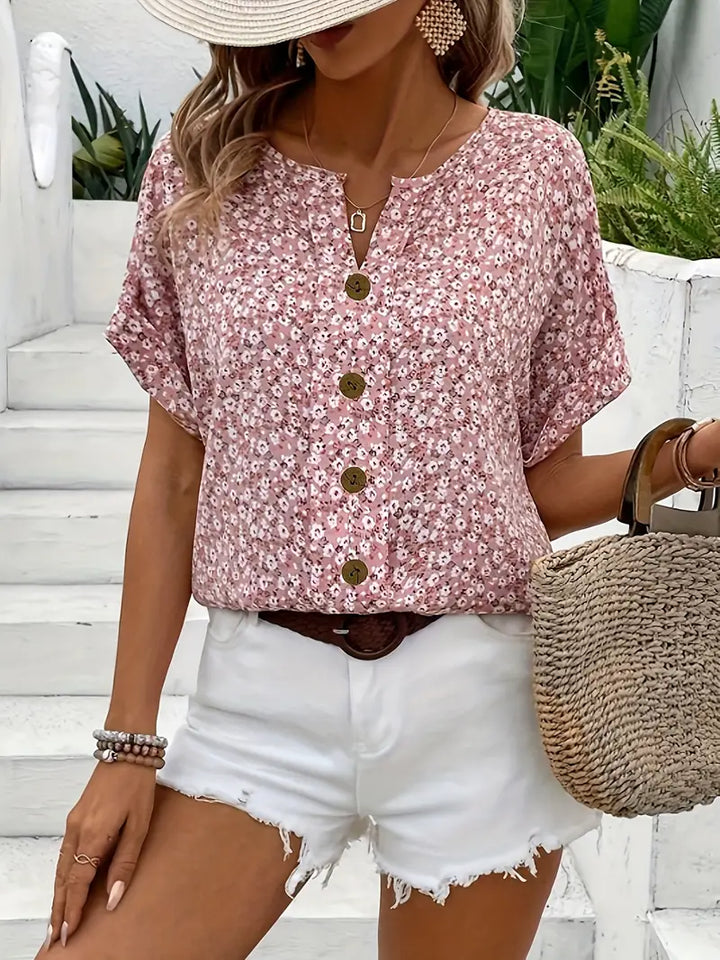 Women's pink floral relaxed fit button-up blouse, perfect for casual chic spring and summer fashion.