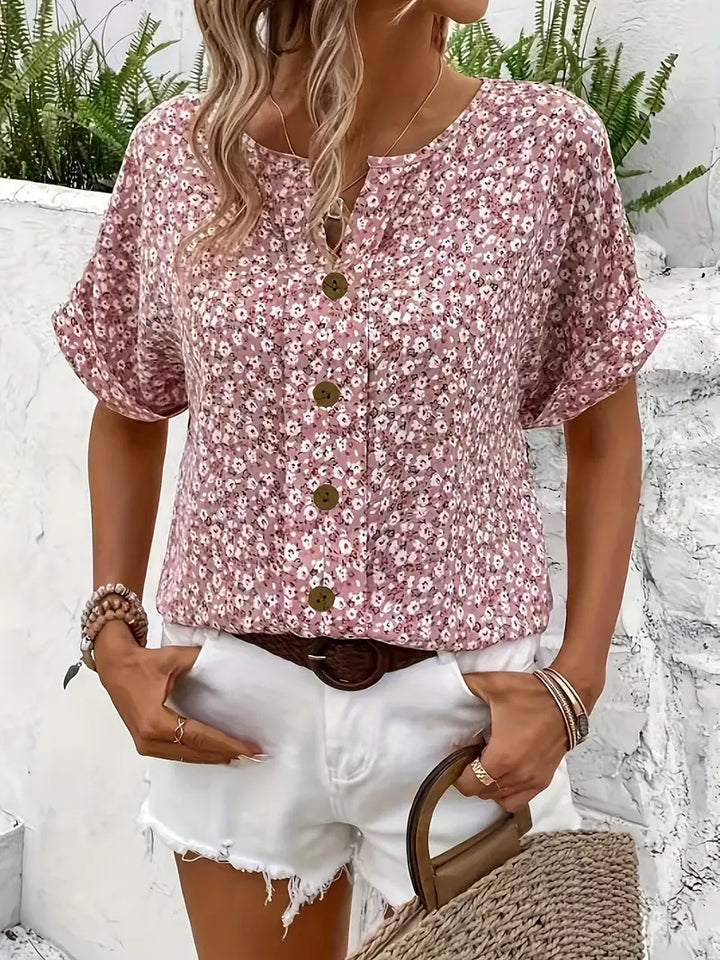 Comfortable women's relaxed fit floral button-up blouse. Casual chic long sleeve top for spring/summer style.