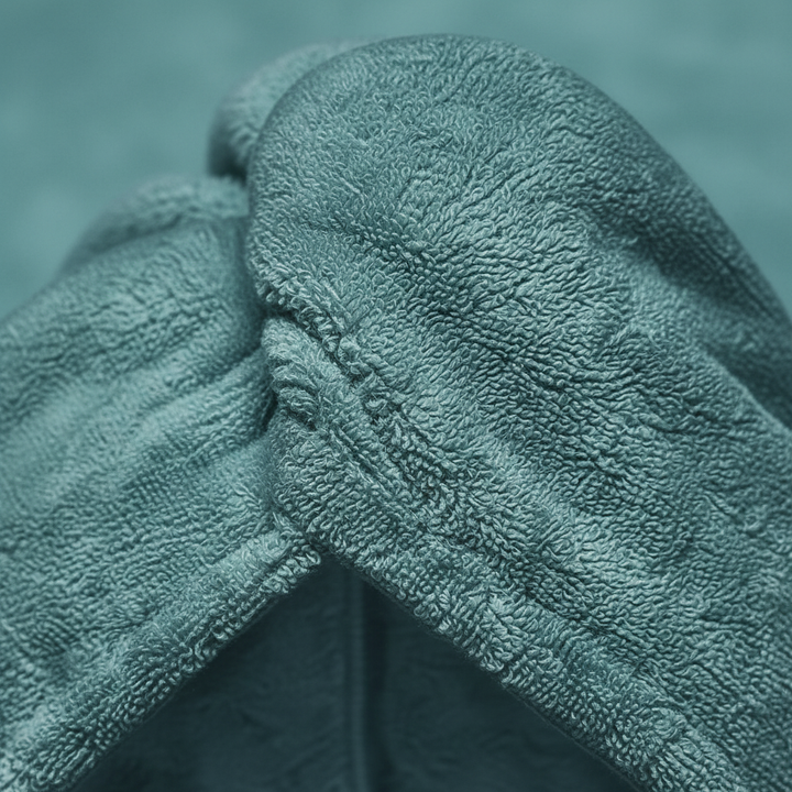 Close-up of fluffy microfiber fabric on an absorbent hair towel, perfect for women's haircare