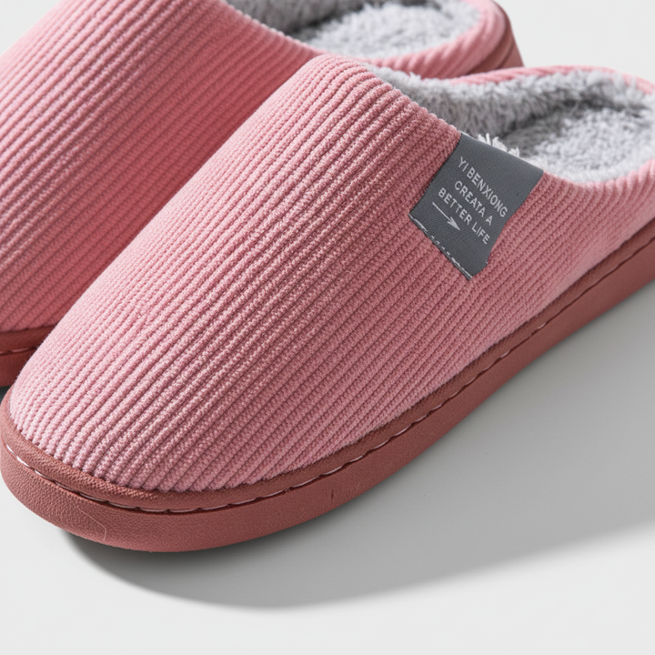 Comfortable women's non-slip house slippers with ribbed fabric in a stylish grey for indoor wear.