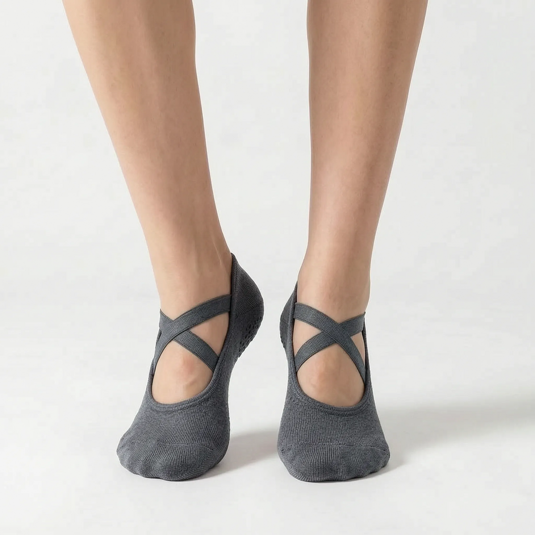 Durable women's non-slip studio socks in pink, offering enhanced grip for activewear, yoga, and fitness routines.