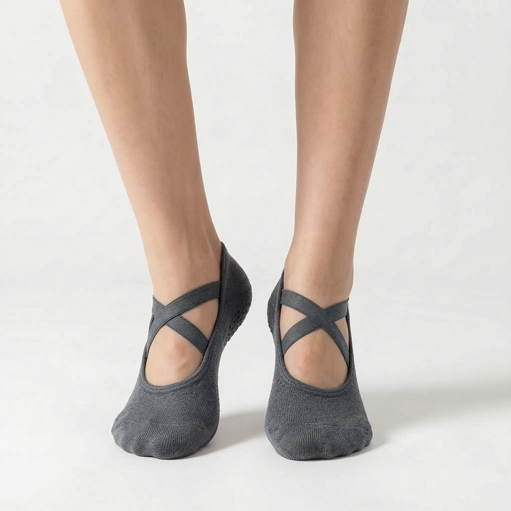Durable women's non-slip studio socks in pink, offering enhanced grip for activewear, yoga, and fitness routines.