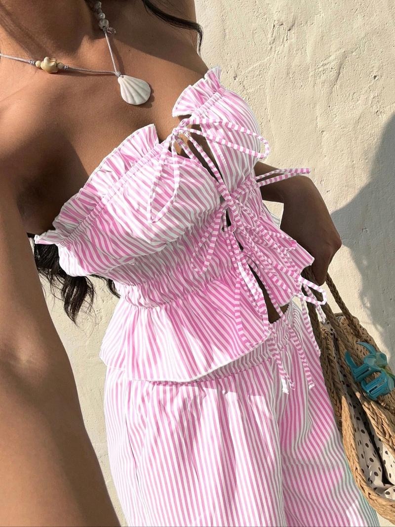 Women's pinstripe bandeau top and matching wide-leg trousers set, ideal for summer casual wear.