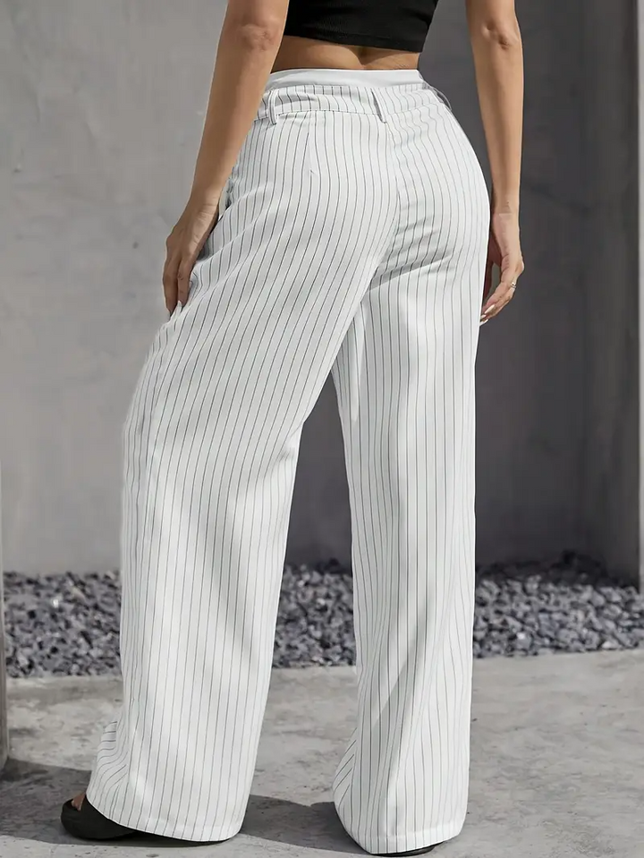 Essential women's pinstripe wide-leg trousers, a stylish and comfortable wardrobe staple.