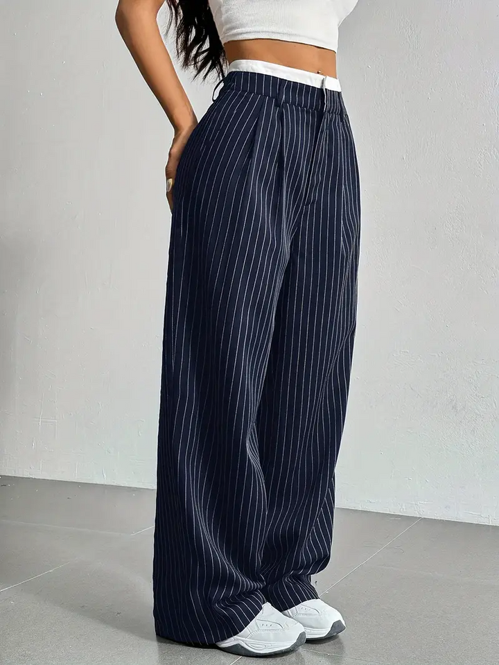 Comfortable women's wide-leg pinstripe trousers, perfect for relaxed yet stylish everyday wear.