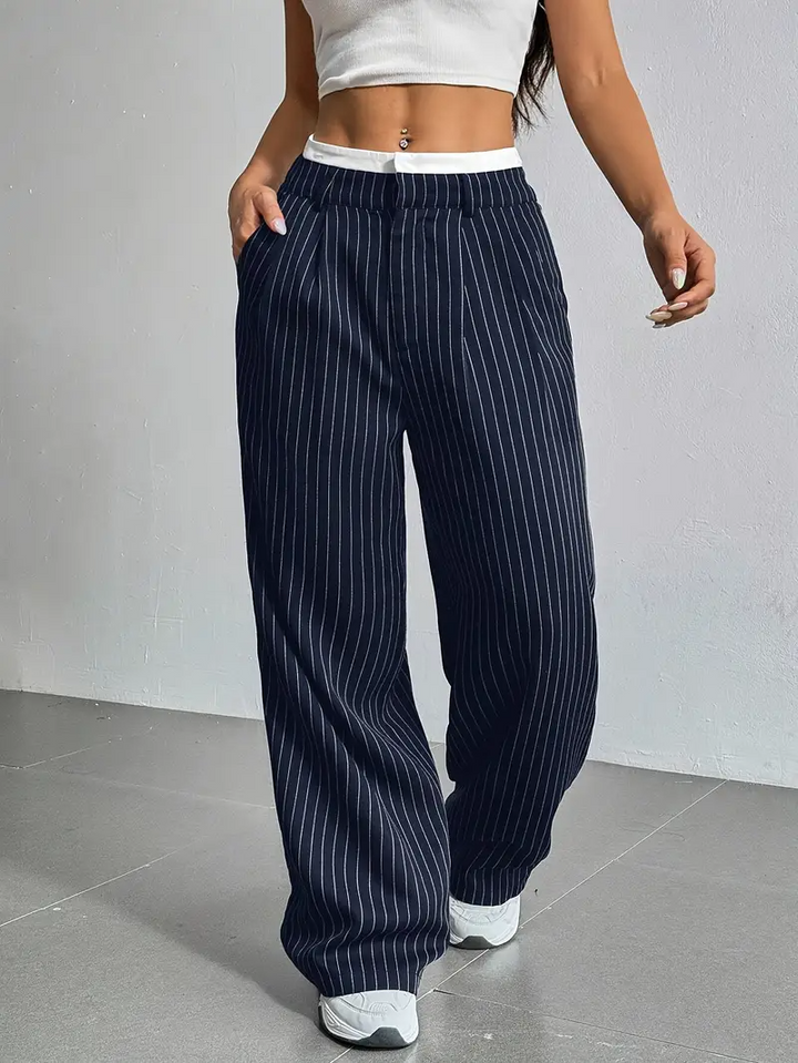 Fashion-forward women's pinstripe wide-leg pants, offering modern style and supreme comfort.