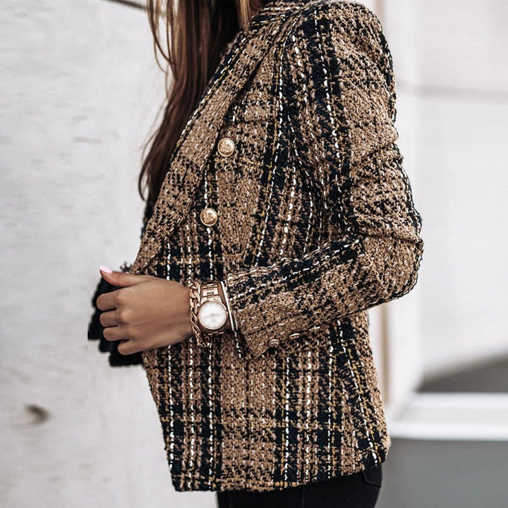 Fashionable women's plaid double-breasted blazer with gold buttons. A tailored, classic jacket for office & casual elegance.