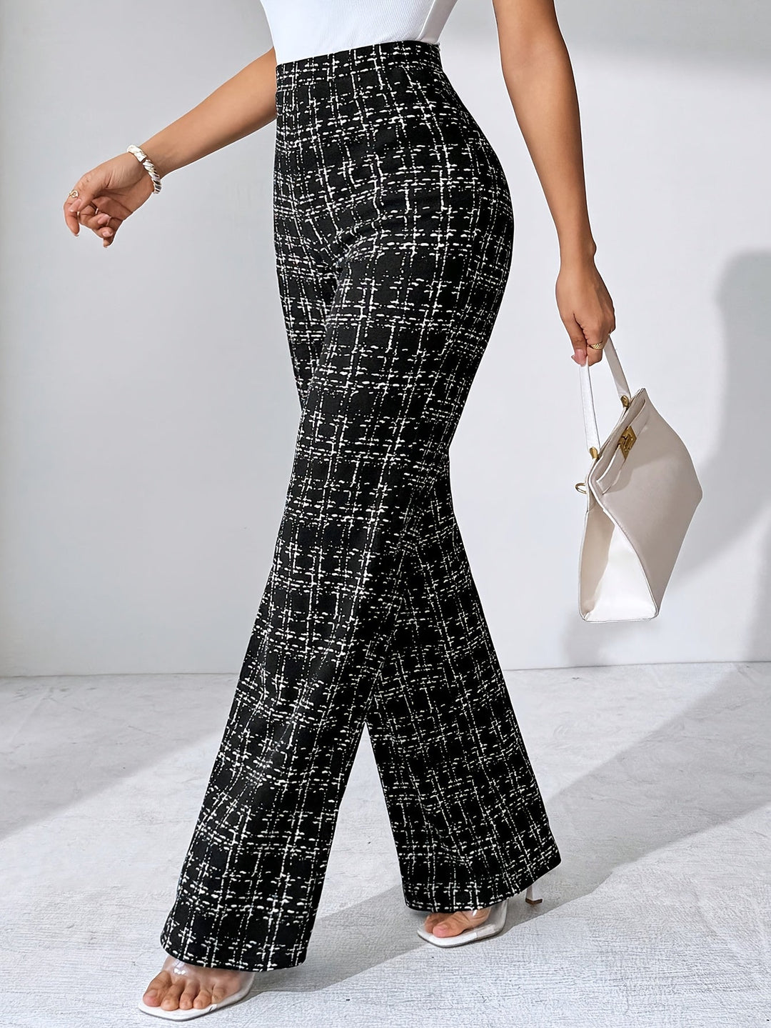 Women's plaid high-waisted flare pants, elegant and comfortable stretch knit trousers.