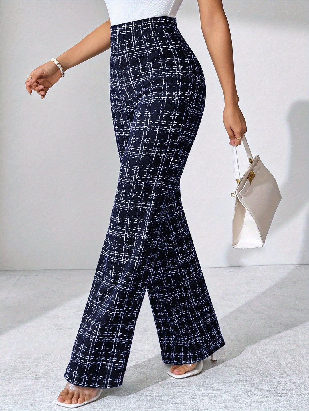 Chic women's stretch knit plaid high-waisted flare trousers, comfortable and stylish.