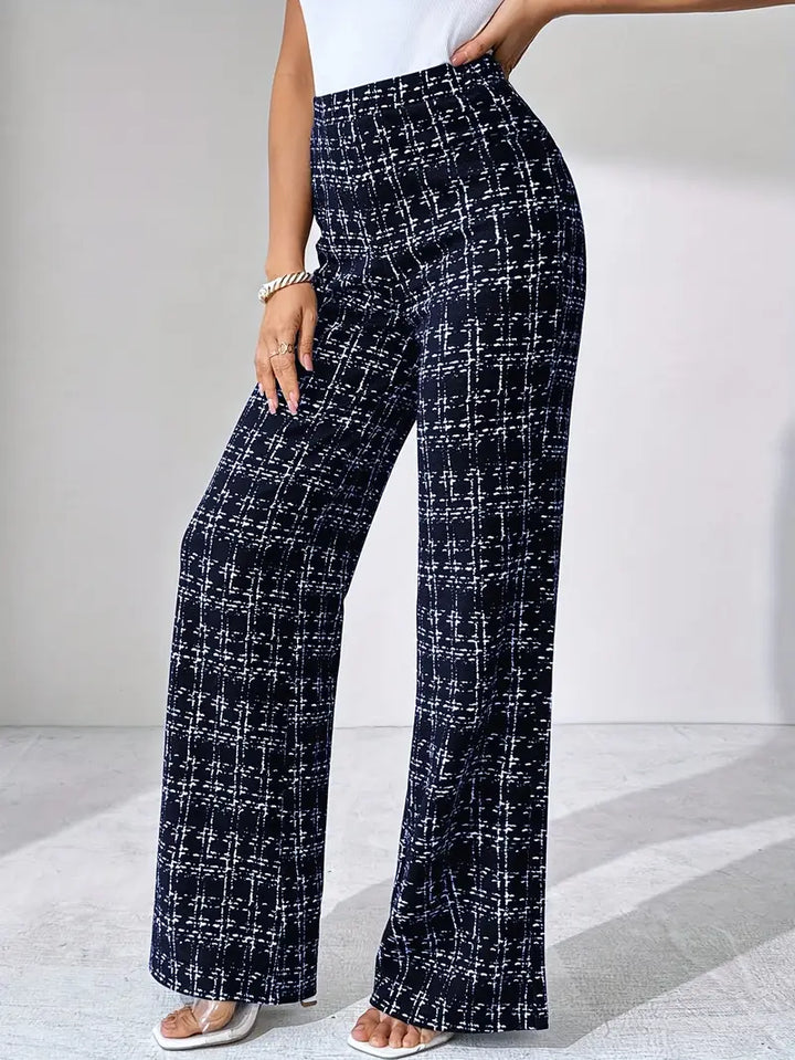 Fashionable women's plaid high-waisted flare trousers, offering stretch and comfort.