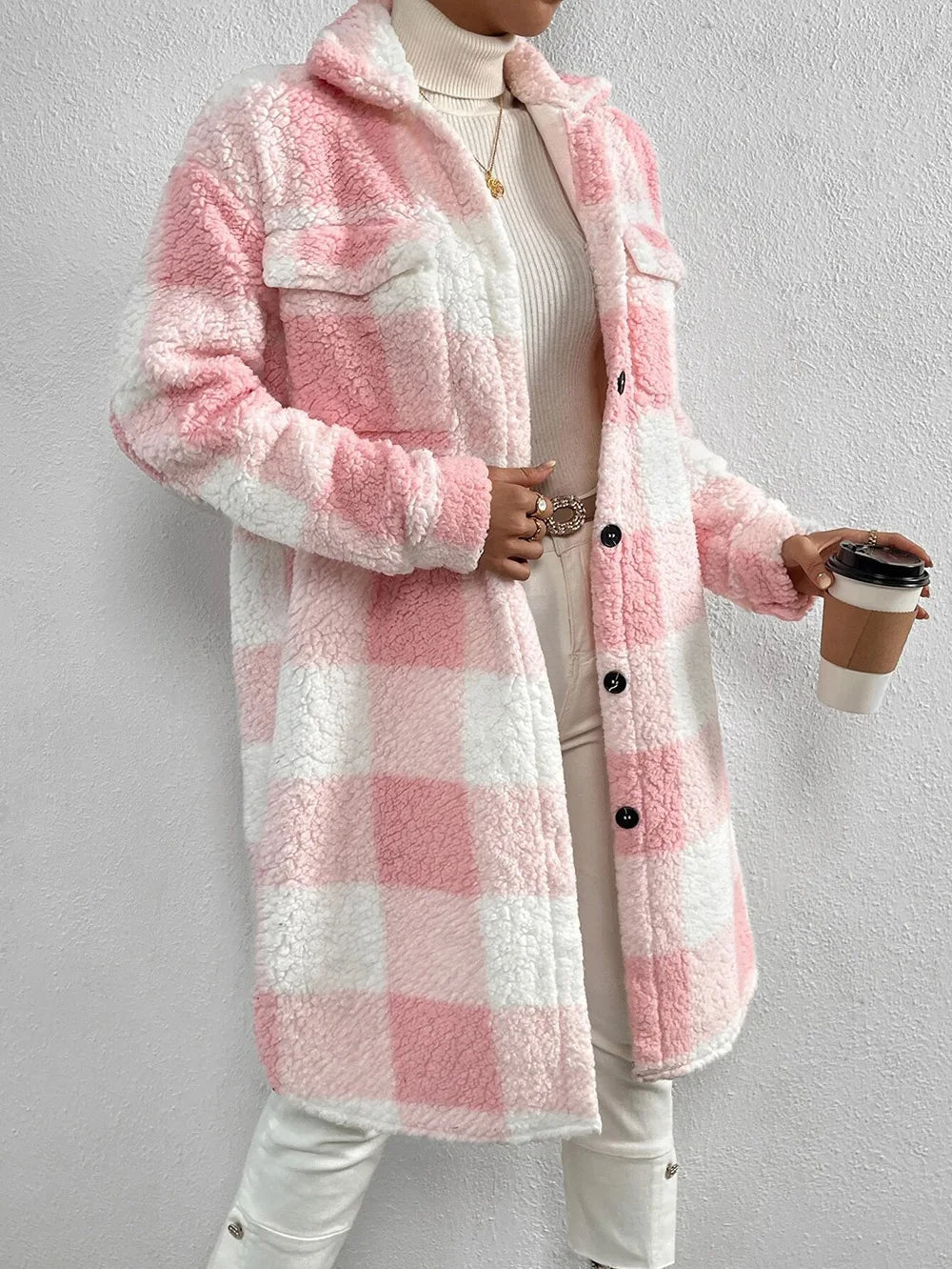 Women's plaid button-up longline jacket, a versatile and warm piece of outerwear for fall.