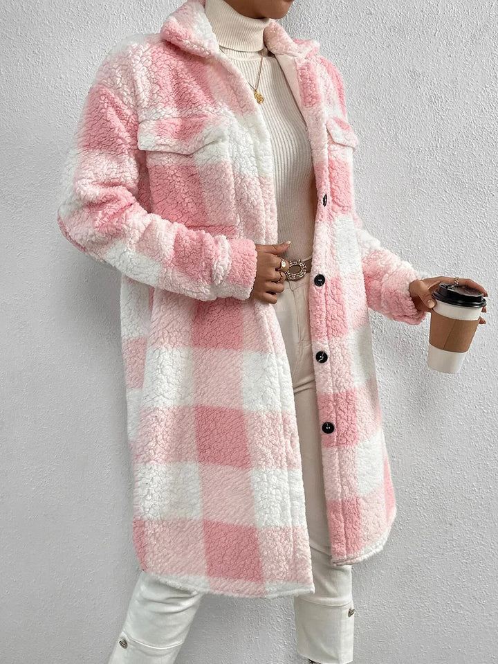 Women's plaid button-up longline jacket, a versatile and warm piece of outerwear for fall.