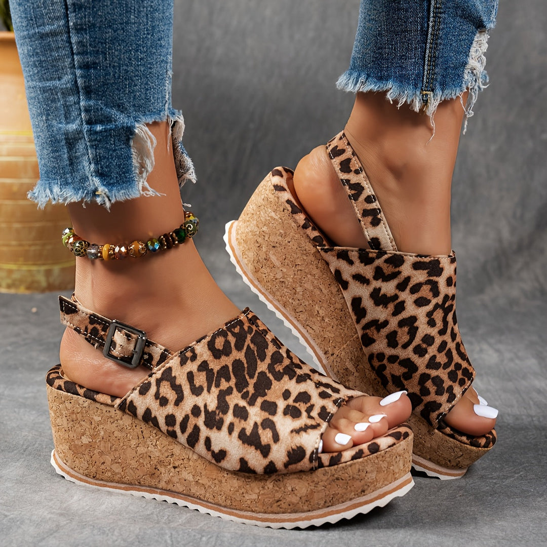 Elevated women's platform buckle sandals with adjustable straps, great for summer fashion.
