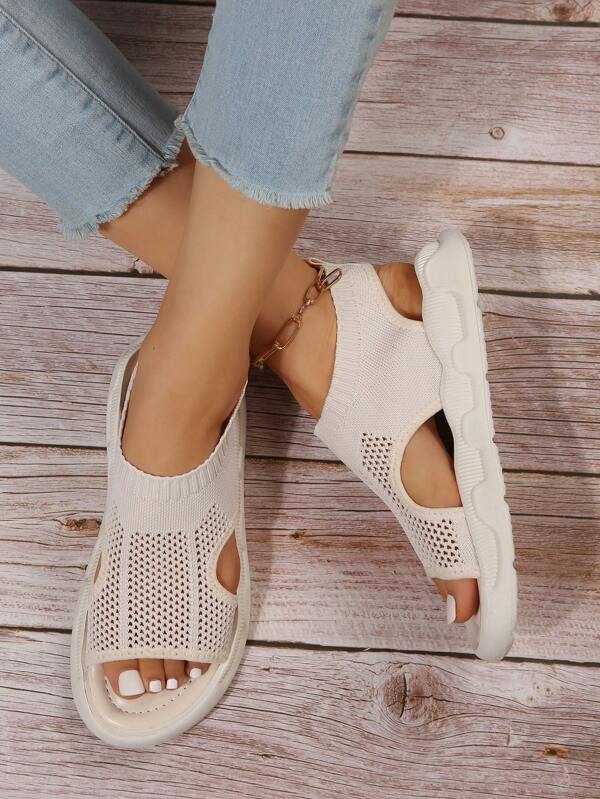 Slip-on women's platform sandals with open toe. Versatile casual walking shoes for summer style.