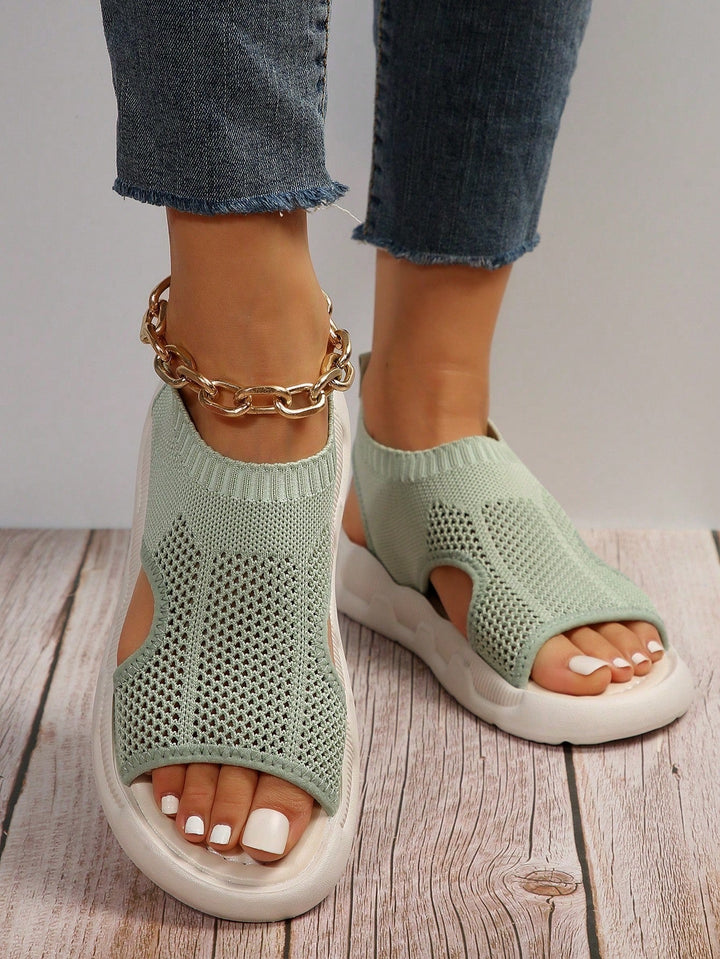 Women's comfortable open-toe platform sandals. Essential slip-on casual footwear for spring.