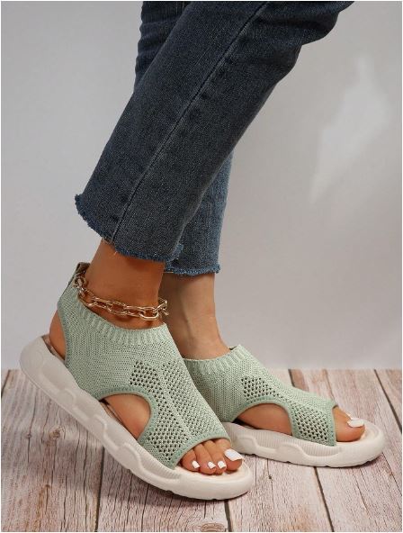 Modern women's platform sandals, open toe. Comfortable slip-on flatform for casual summer wear.