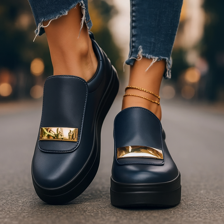 Chic women's platform sneakers featuring gold accents & elevated style.