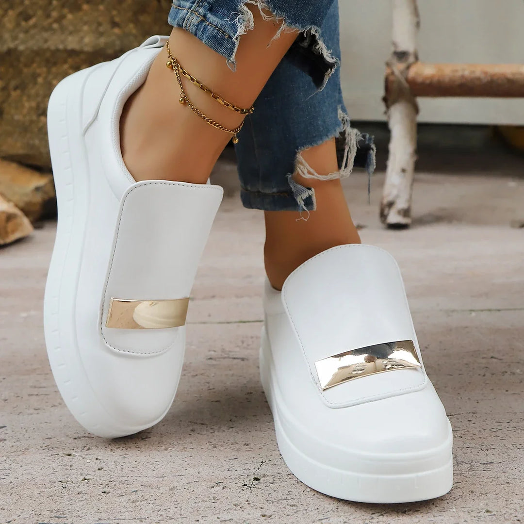 Women's fashionable platform sneakers with orthopedic support & chic gold accents.